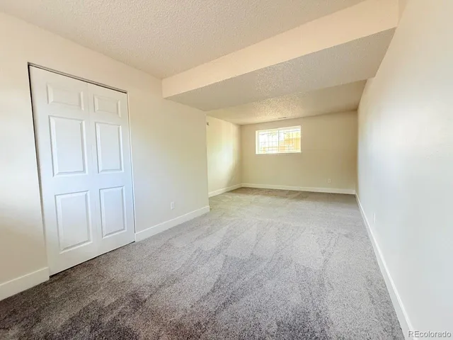 a bathroom with a sink a mirror and a toilet