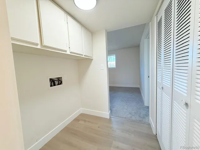 a bathroom with a tub and shower