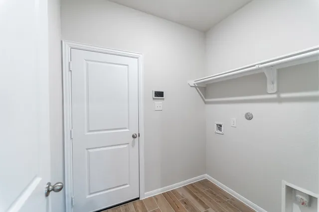 a view of small space with wooden floor