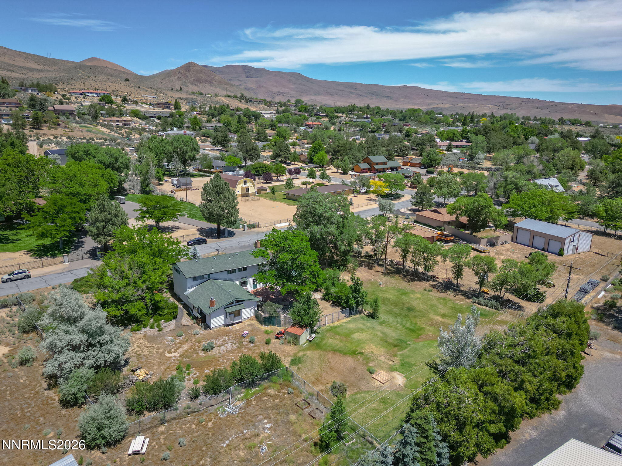 549 Ruby Lane Carson City, NV 89706 - Photo 29 of 37 an aerial view of residential house with outdoor space and trees all around