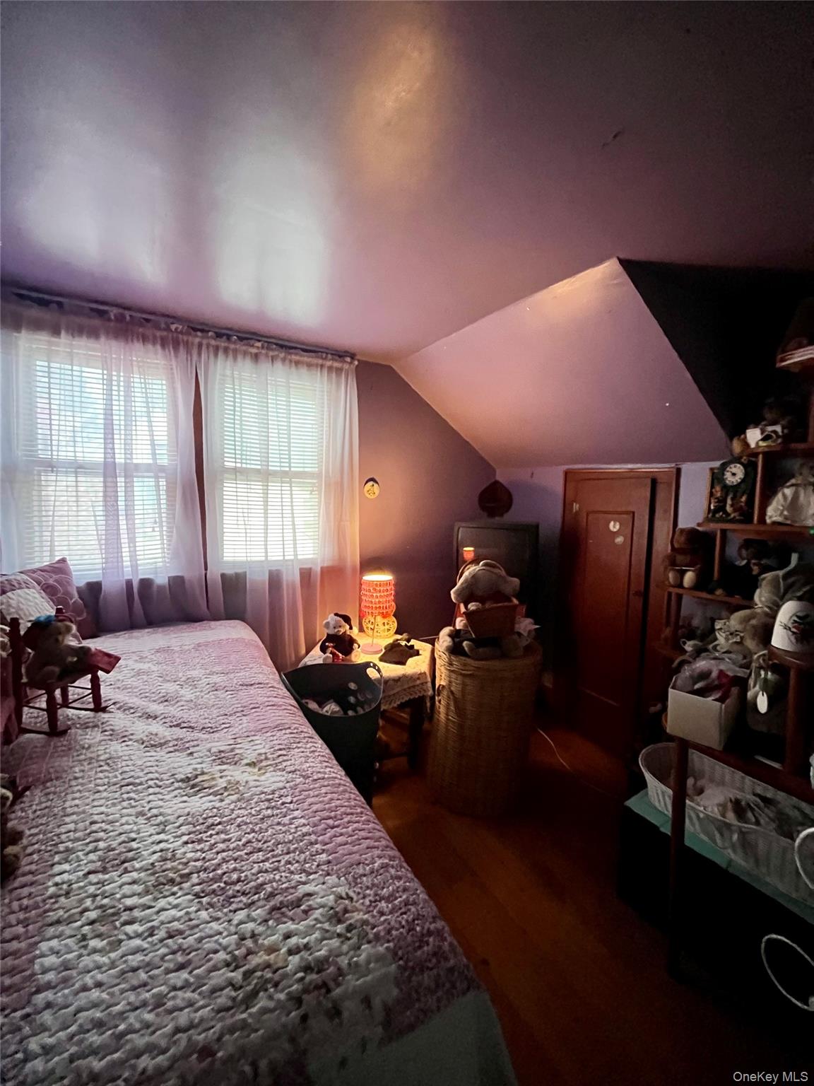 35 Spring Street Goshen, NY 10924 - Photo 17 of 26 a bed room with a bed furniture and a window