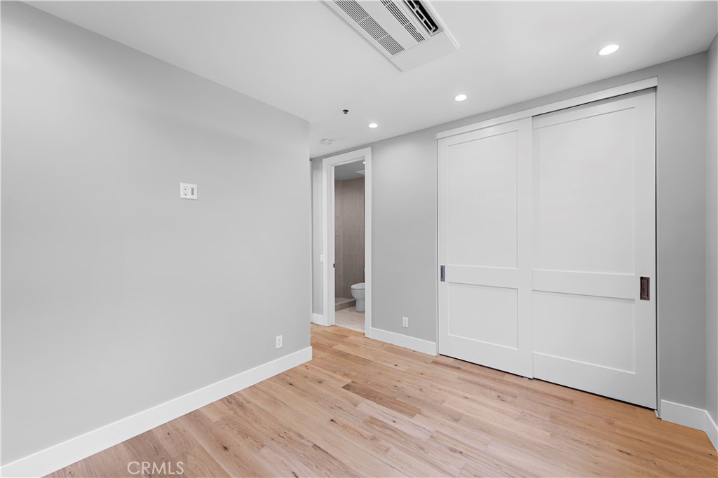 33901 Robles Drive Dana Point, CA 92629 - Photo 9 of 12 a view of an empty room with wooden floor