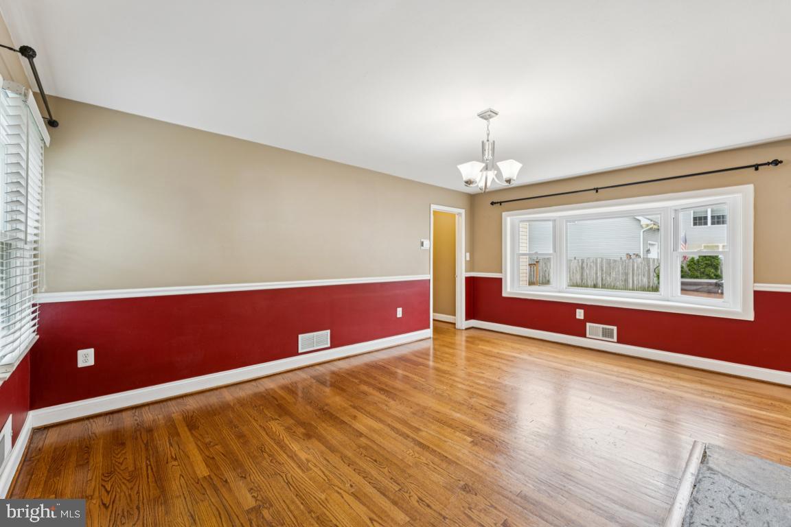 5 Brookfield Road Pasadena, MD 21122 - Photo 11 of 34 a view of an empty room with window