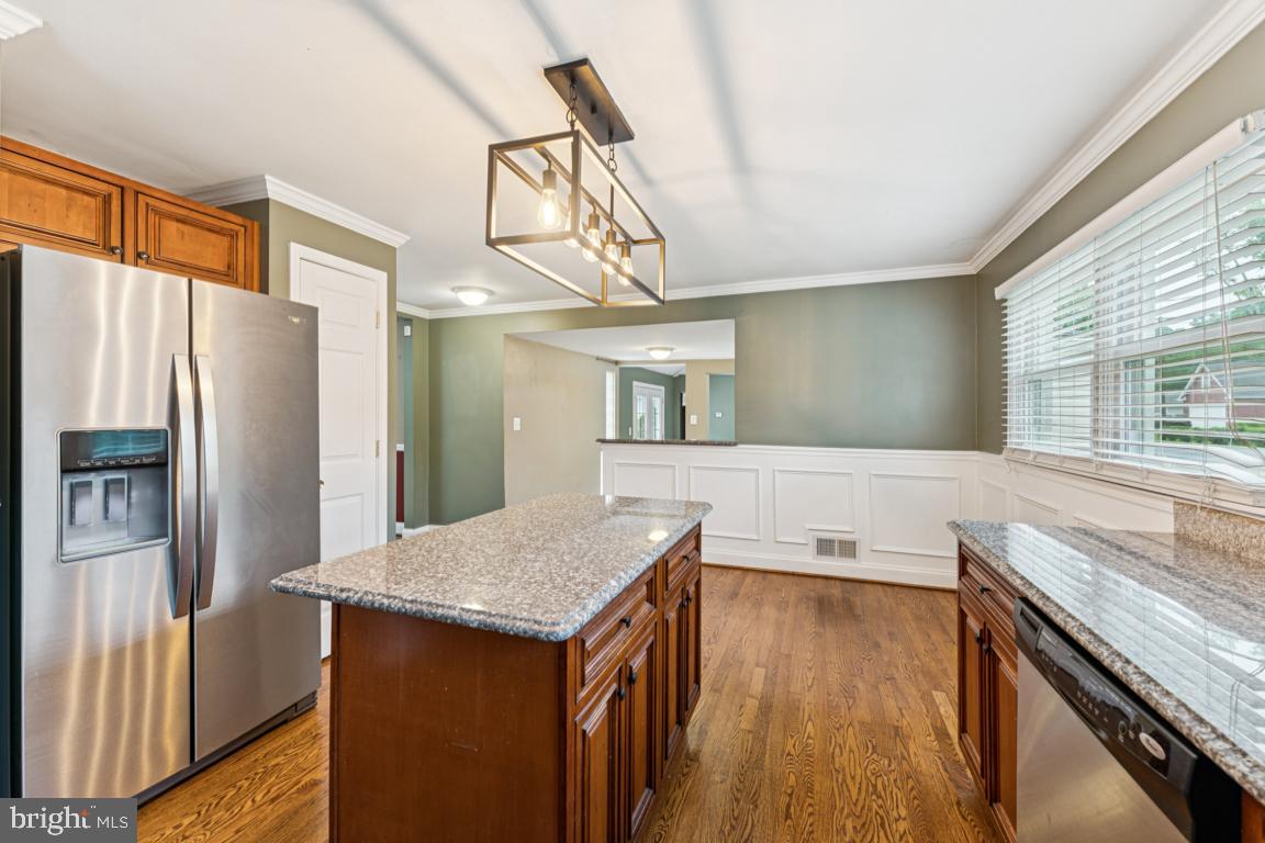 5 Brookfield Road Pasadena, MD 21122 - Photo 4 of 34 a kitchen with a sink appliances and cabinets