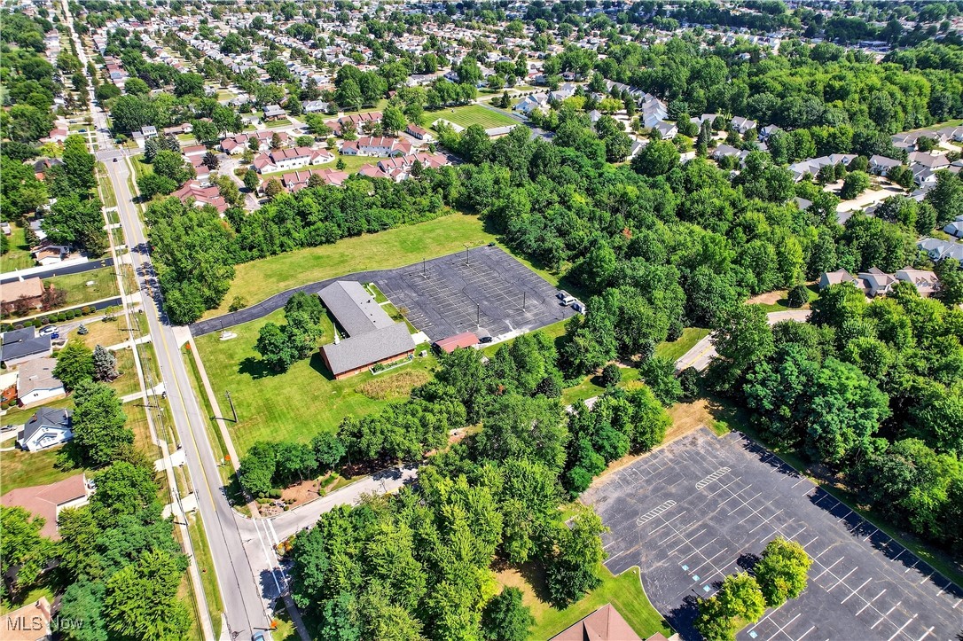 6689 Fry Road Middleburg Heights, OH 44130 - Photo 12 of 17 Drone / aerial view of a tree filled landscape