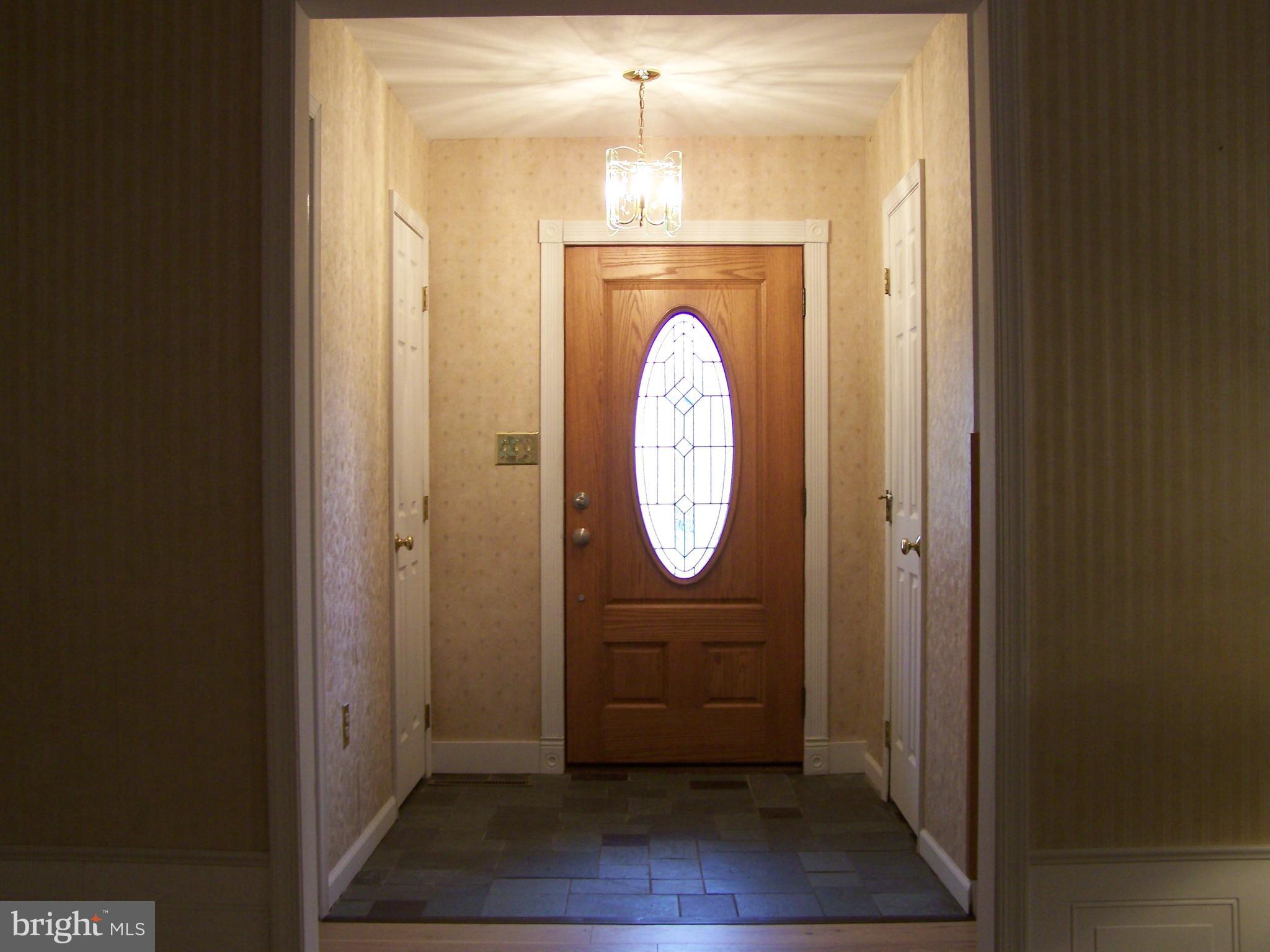 2500 Berkley Road Reading, PA 19605 - Photo 5 of 25 Slate Floor foyer w/ lead glass entry door