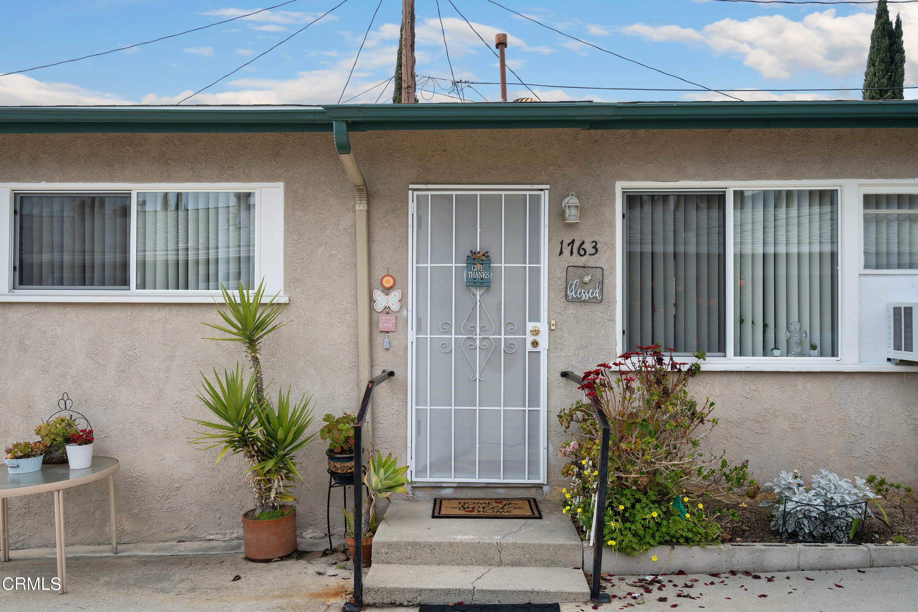 1761 Atchison Street Pasadena, CA 91104 - Photo 16 of 30 a front view of a house with a garden