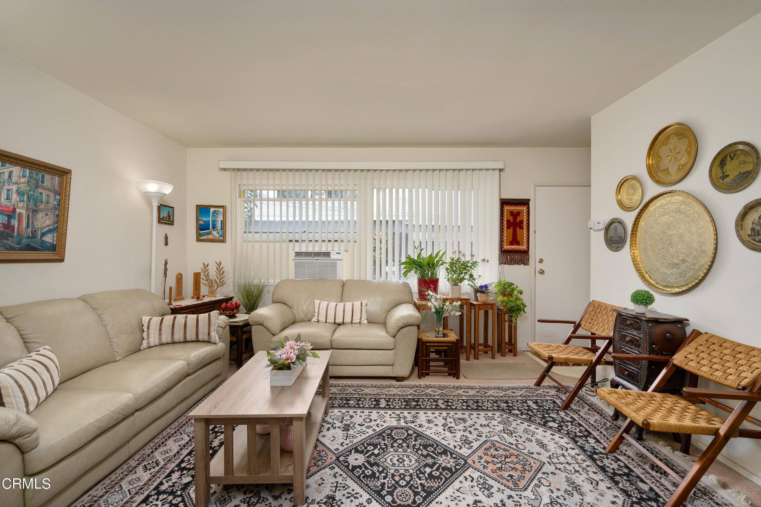 1761 Atchison Street Pasadena, CA 91104 - Photo 20 of 30 a living room with furniture rug and window