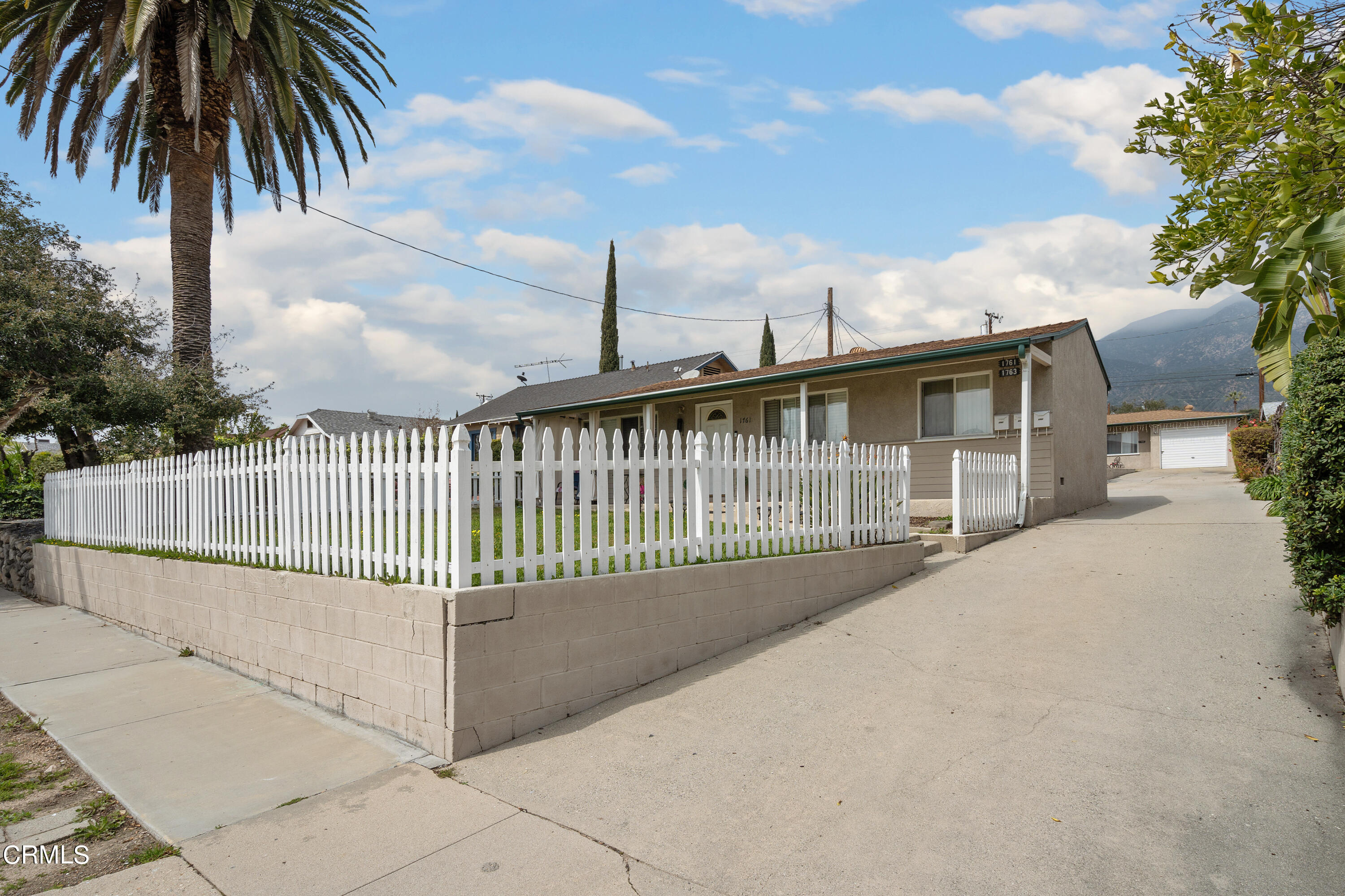 1761 Atchison Street Pasadena, CA 91104 - Photo 2 of 30 a view of a balcony with a yard
