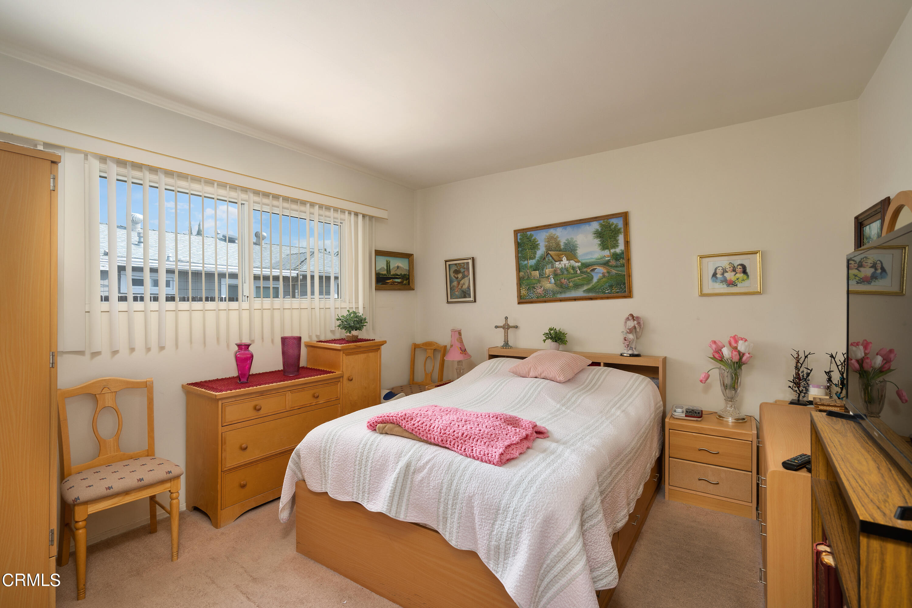 1761 Atchison Street Pasadena, CA 91104 - Photo 24 of 30 a bedroom with a bed and furniture