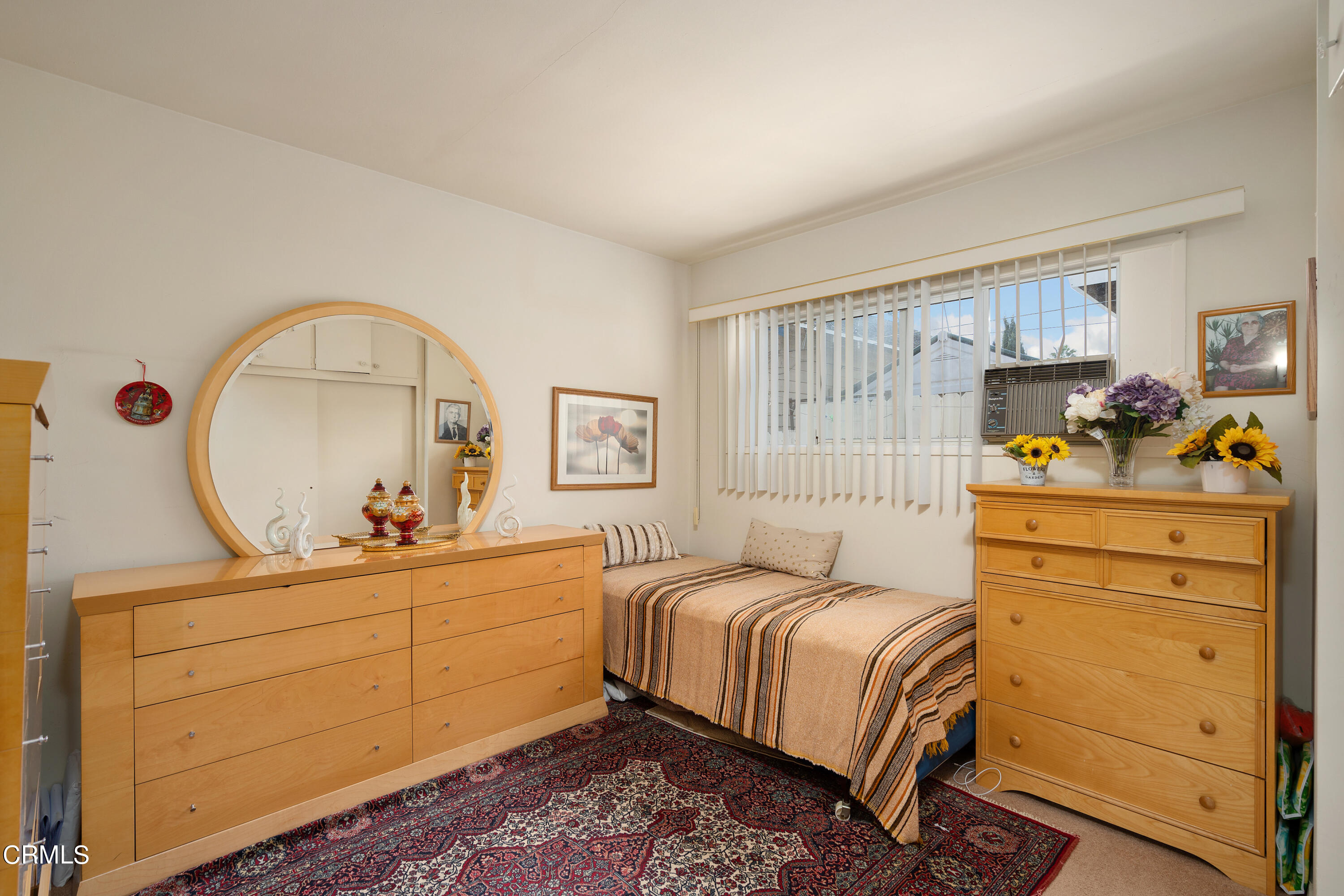 1761 Atchison Street Pasadena, CA 91104 - Photo 25 of 30 a bedroom with a bed and a dresser