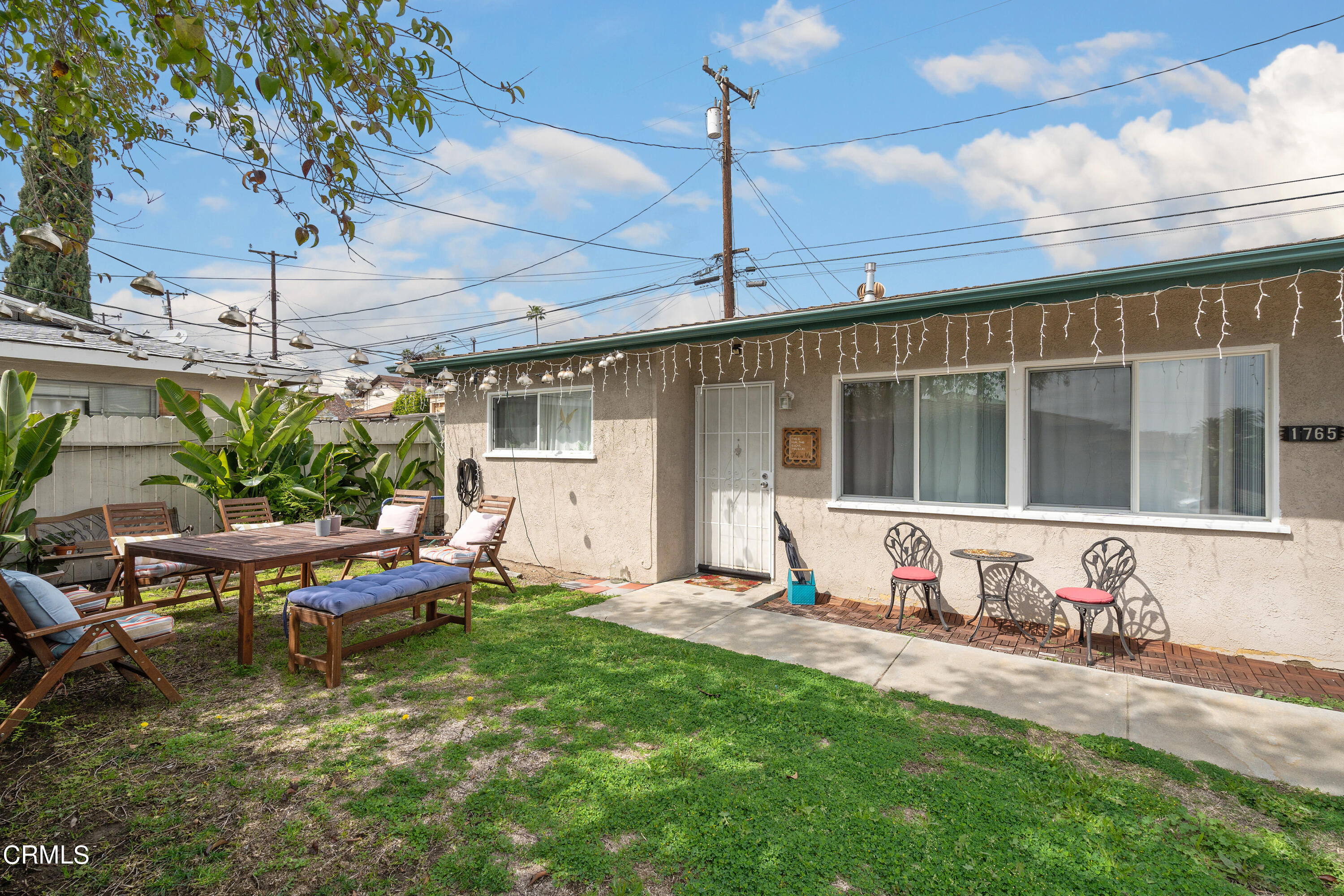 1761 Atchison Street Pasadena, CA 91104 - Photo 27 of 30 a view of a house with backyard sitting area and garden