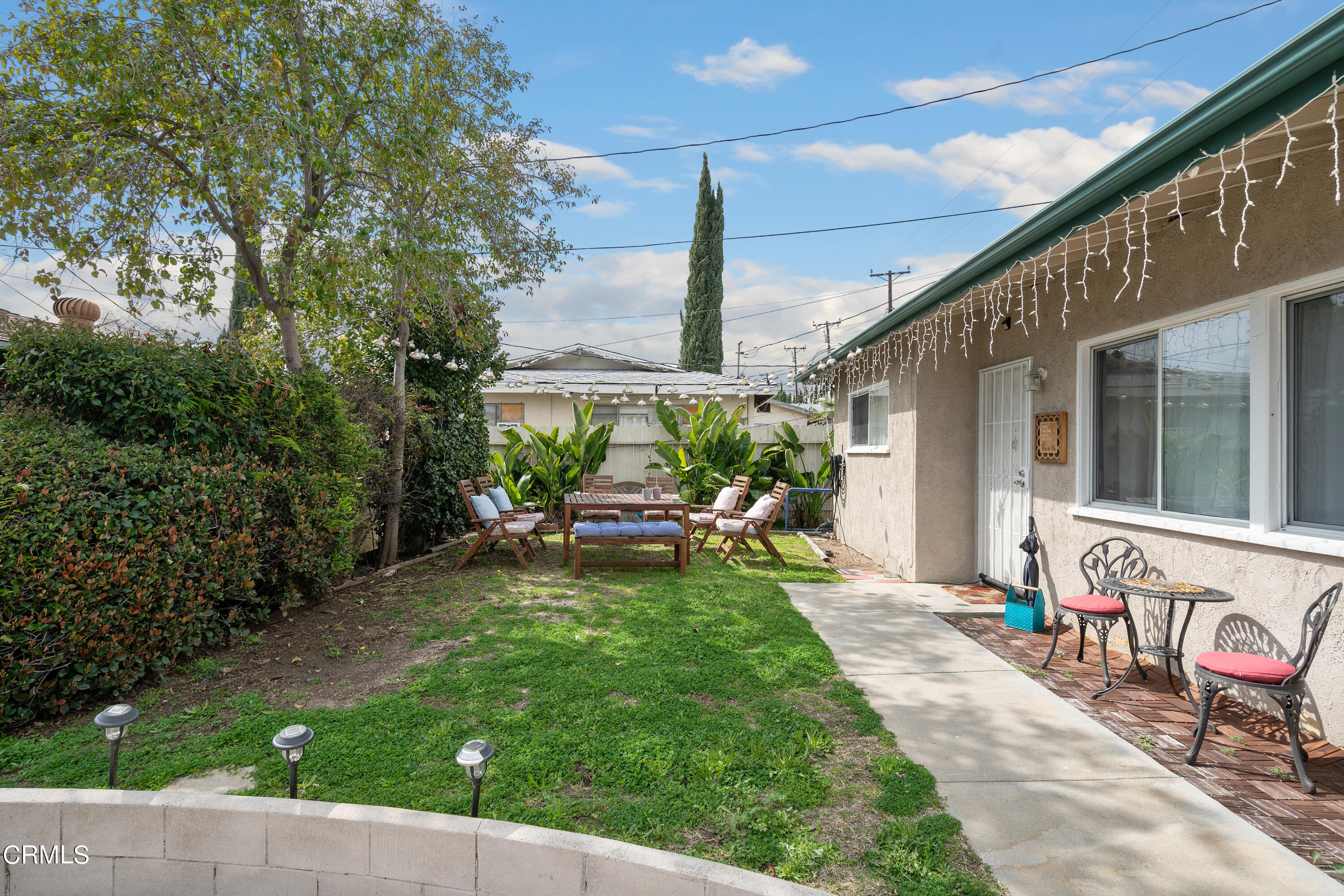 1761 Atchison Street Pasadena, CA 91104 - Photo 28 of 30 a view of a backyard with sitting area