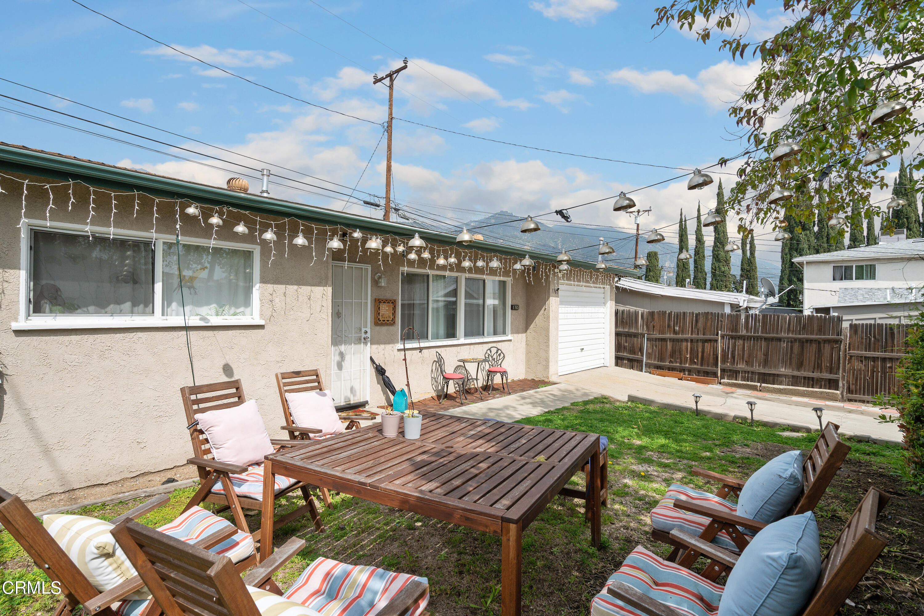 1761 Atchison Street Pasadena, CA 91104 - Photo 29 of 30 a backyard of a house with outdoor seating