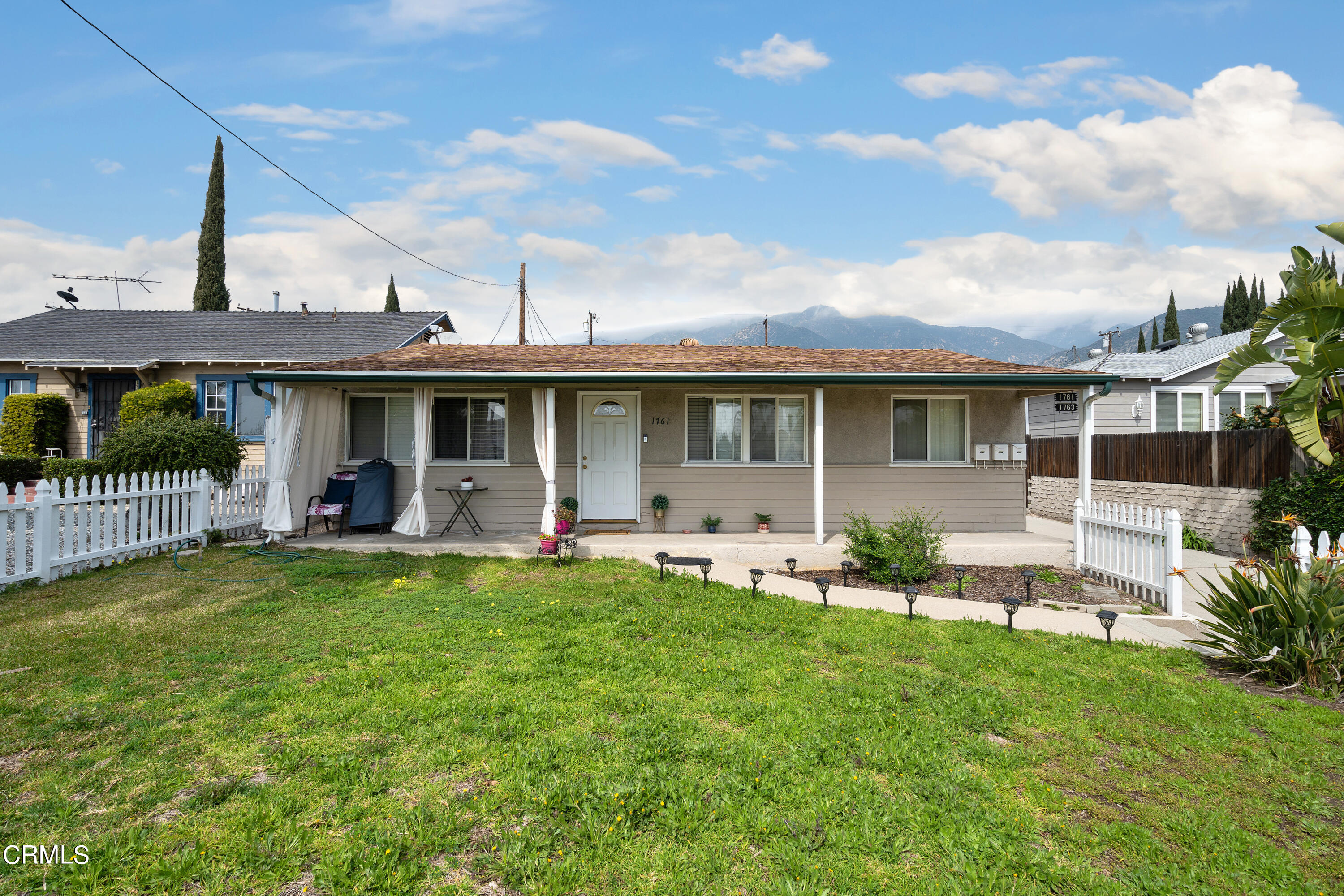 1761 Atchison Street Pasadena, CA 91104 - Photo 3 of 30 a front view of a house with garden and porch