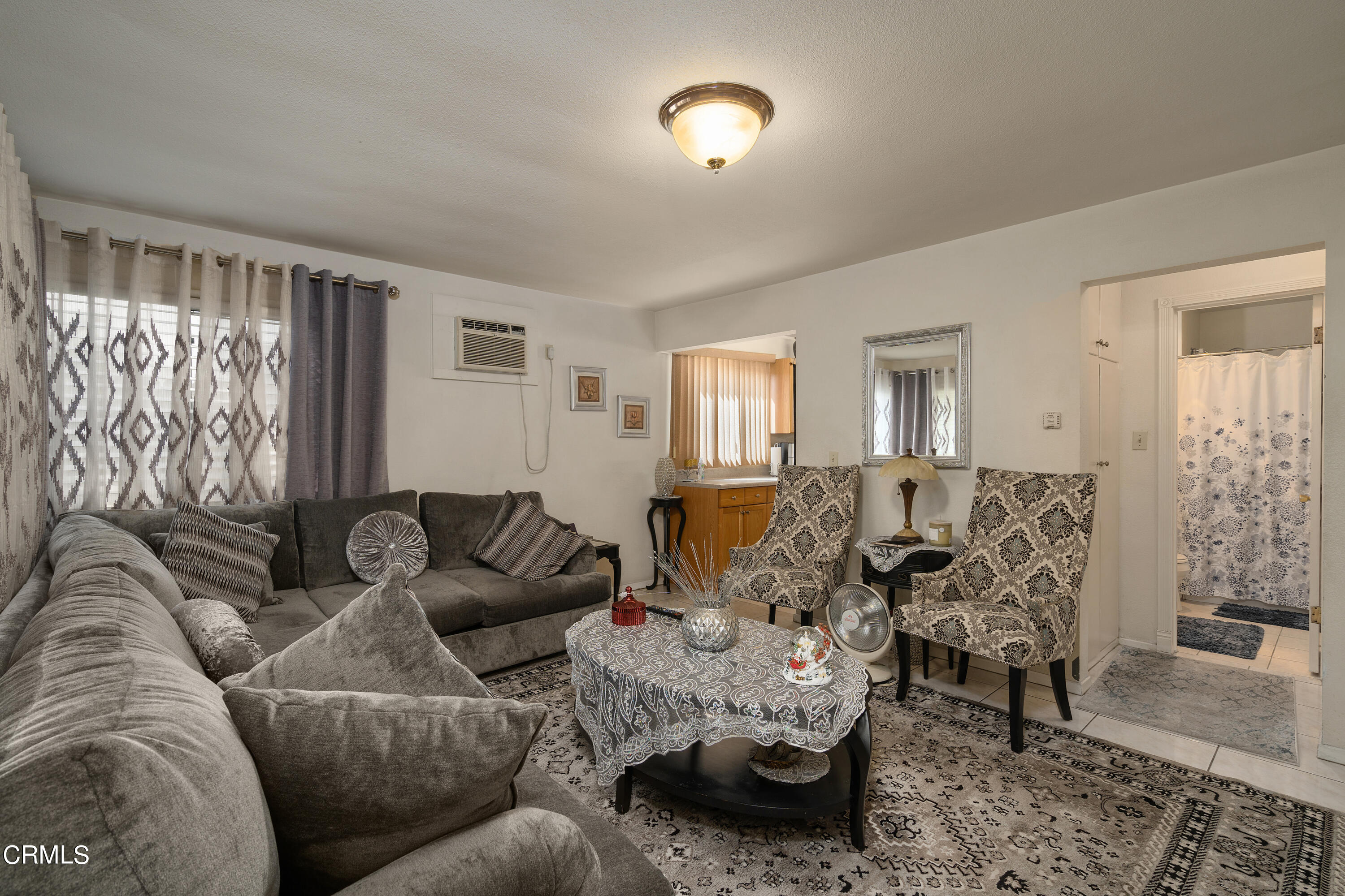 1761 Atchison Street Pasadena, CA 91104 - Photo 6 of 30 a living room with furniture and wooden floor