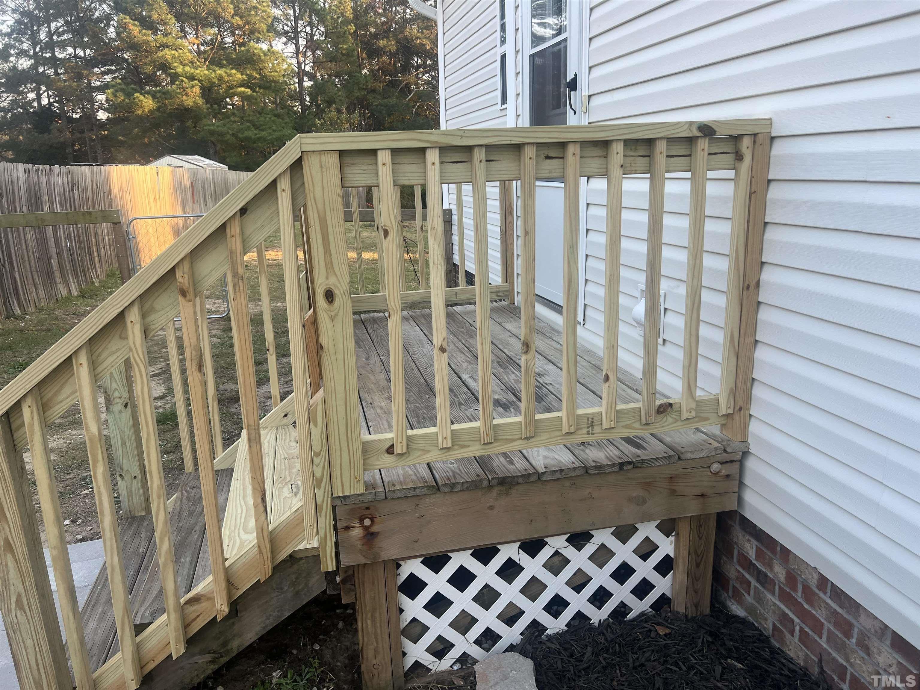 1219 Ridge Road Benson, NC 27504 - Photo 15 of 57 a view of wooden balcony