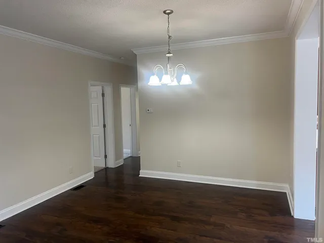 a view of a bathroom with a glass door and a shower