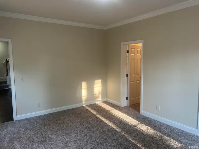 a bathroom with a glass door shower
