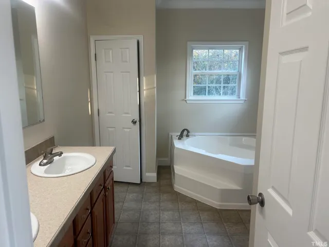 a large kitchen with a large window