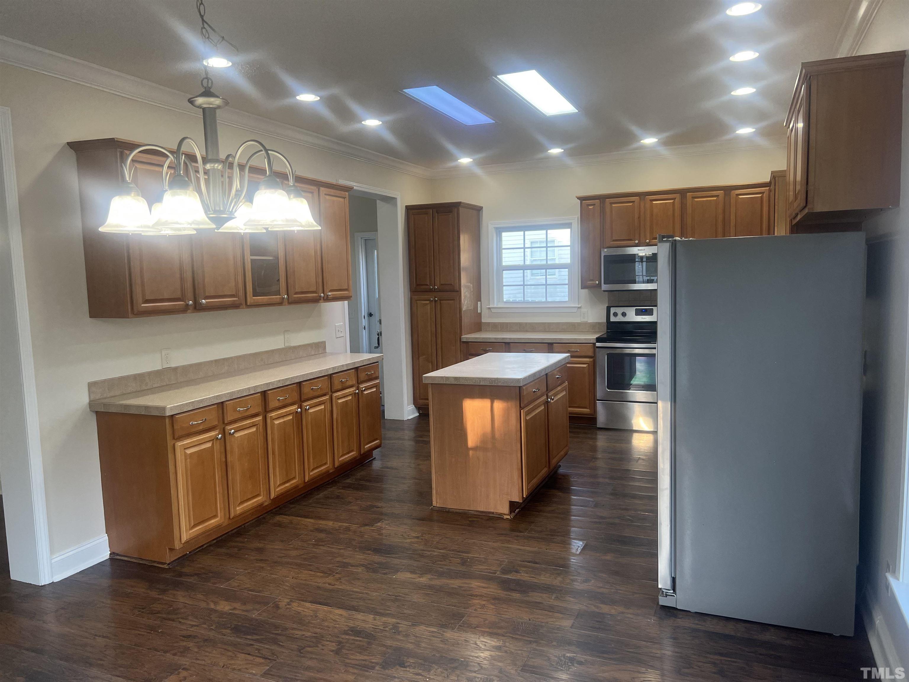 1219 Ridge Road Benson, NC 27504 - Photo 42 of 57 a large kitchen with a large window