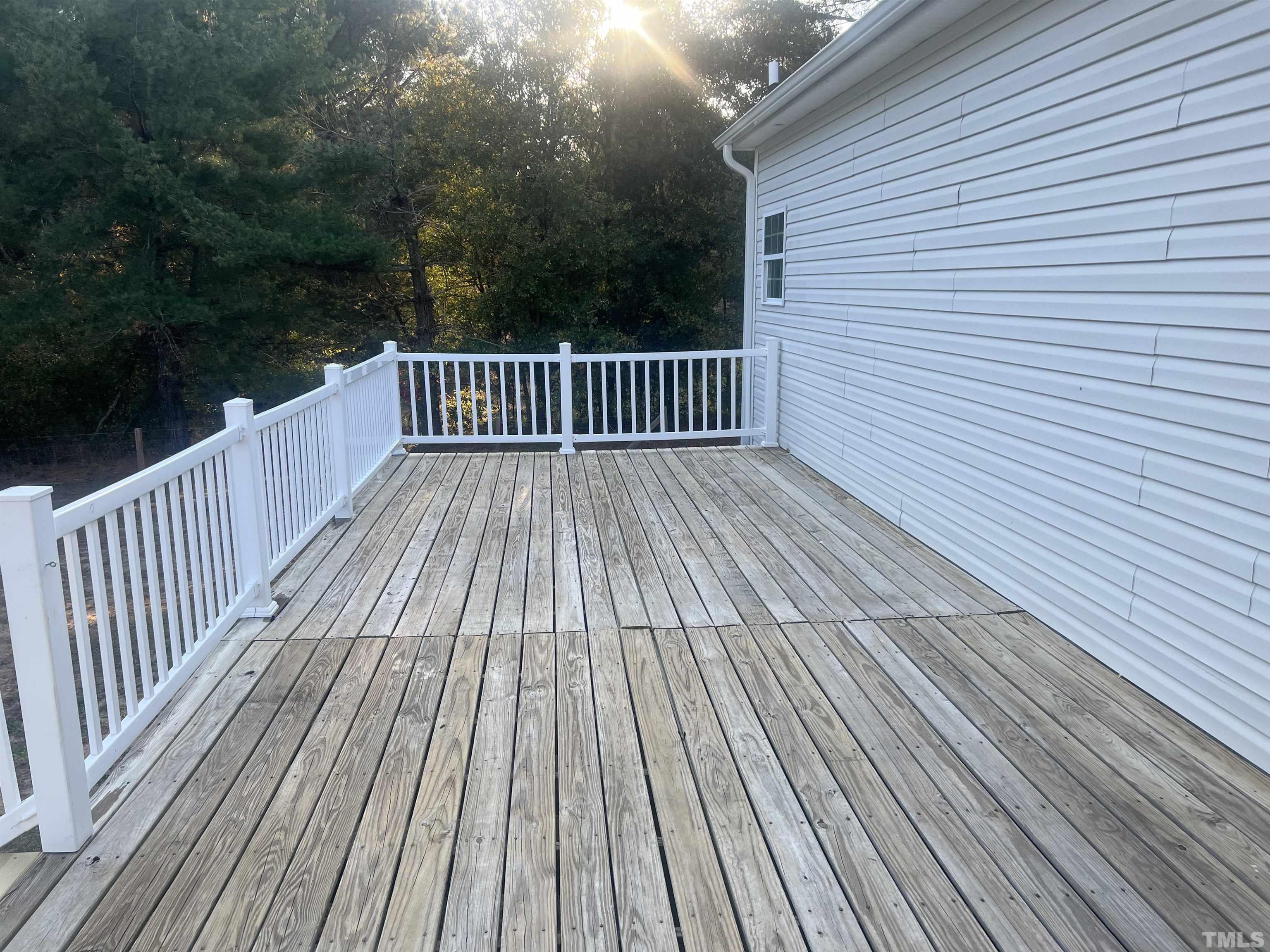 1219 Ridge Road Benson, NC 27504 - Photo 7 of 57 a view of backyard with deck