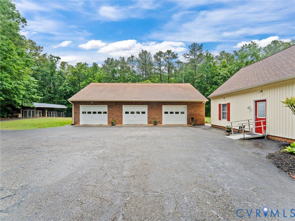 3420 State Rte 656 Powhatan, VA 23139 - Photo 30 of 37 a house with a large trees in front of it