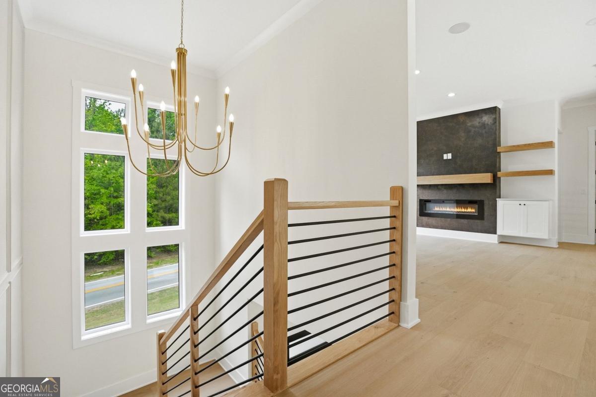 1557 Whitley Road Dacula, GA 30019 - Photo 27 of 46 a view of a hallway with furniture and window
