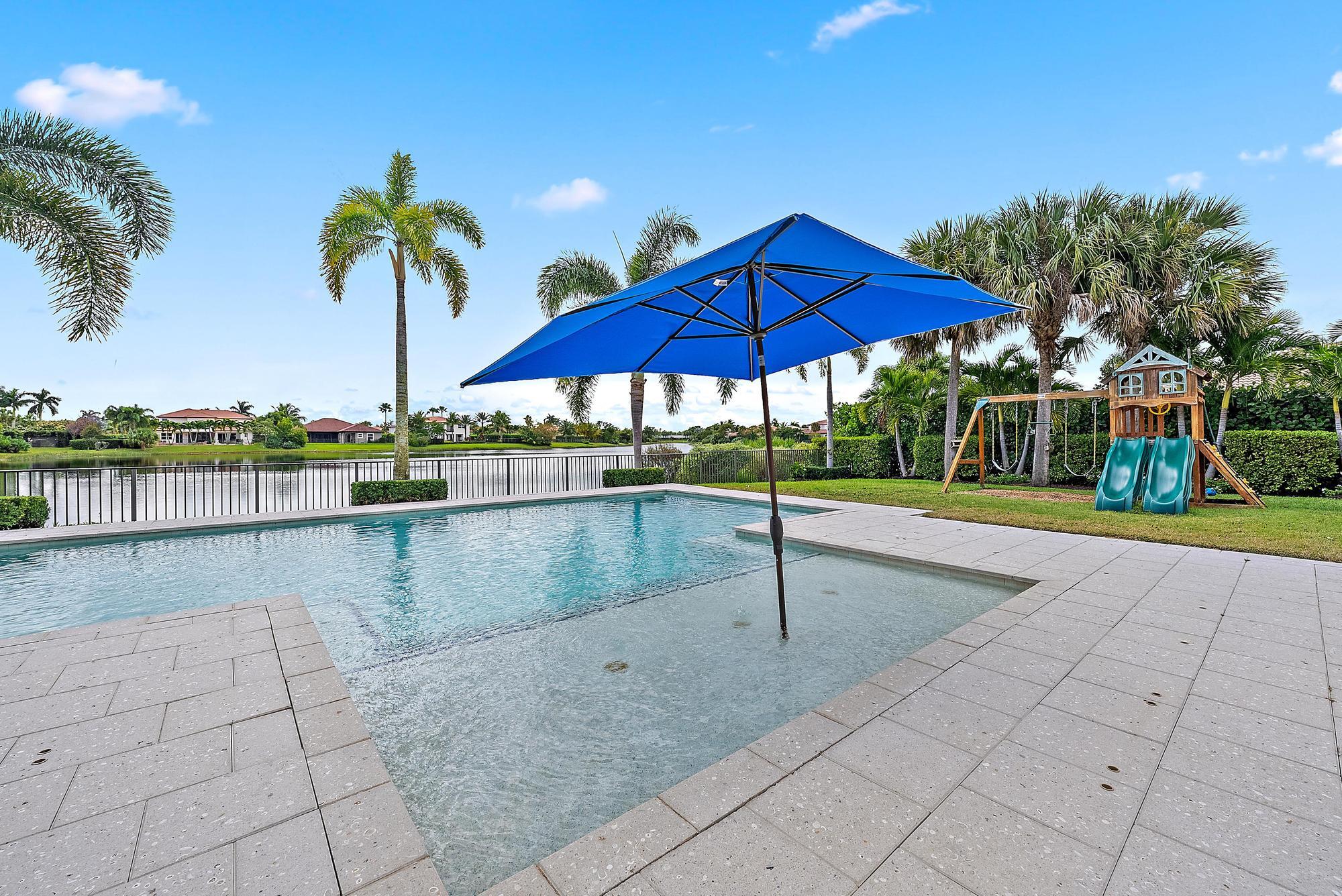 112 Manor Circle Jupiter, FL 33458 - Photo 34 of 59 Back Exterior/ Pool