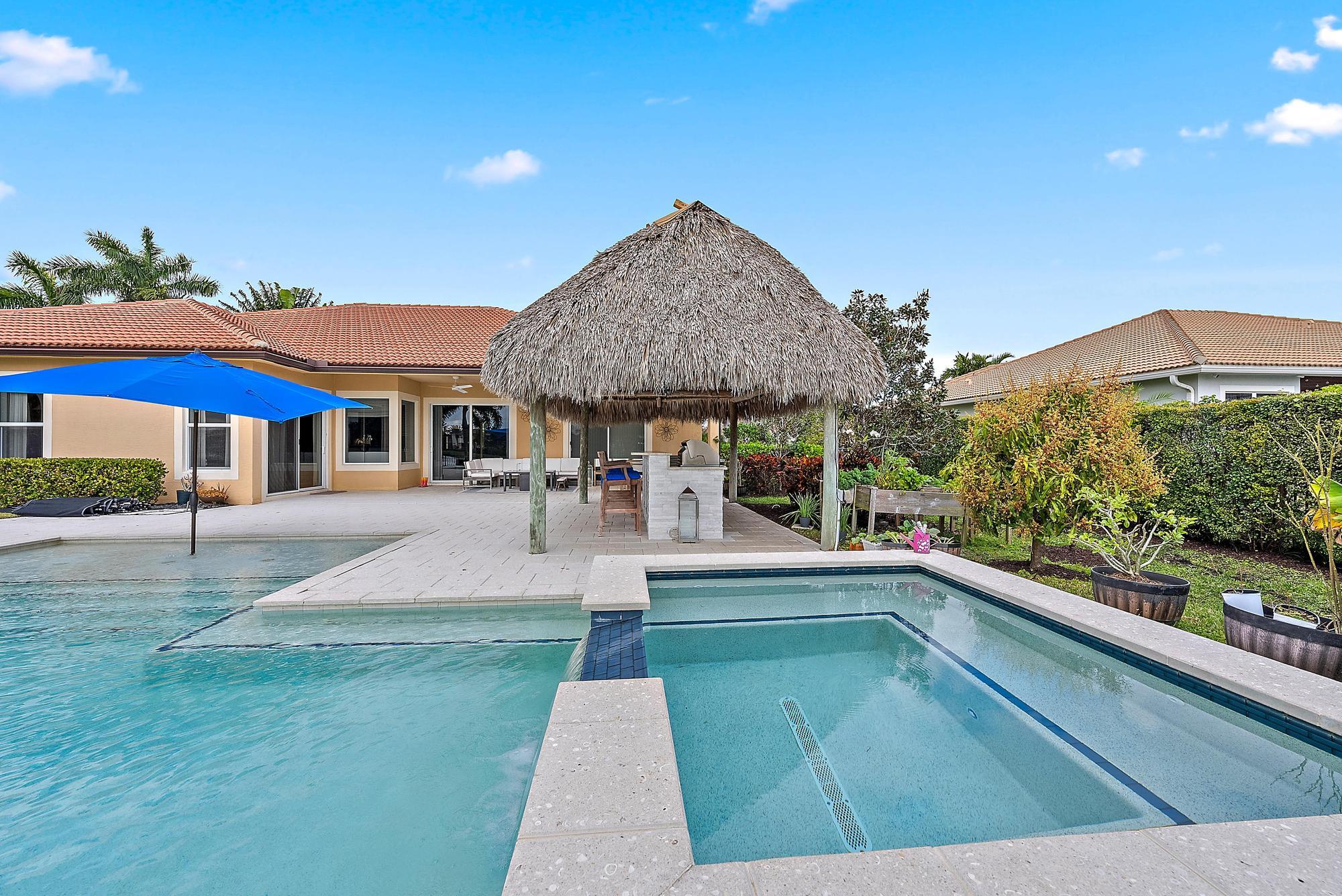 112 Manor Circle Jupiter, FL 33458 - Photo 36 of 59 Back Exterior/ Pool & Spa