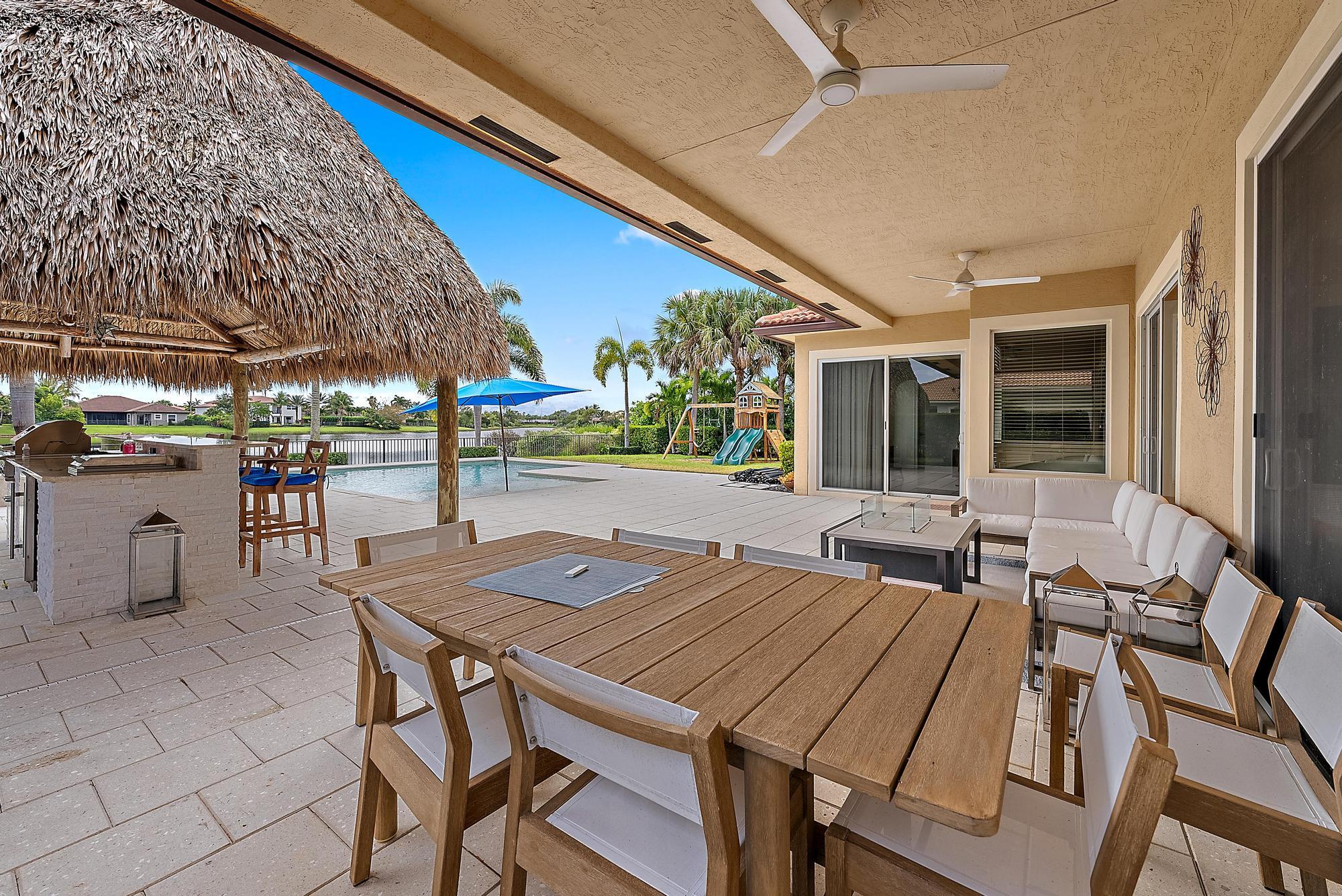 112 Manor Circle Jupiter, FL 33458 - Photo 37 of 59 Covered Patio