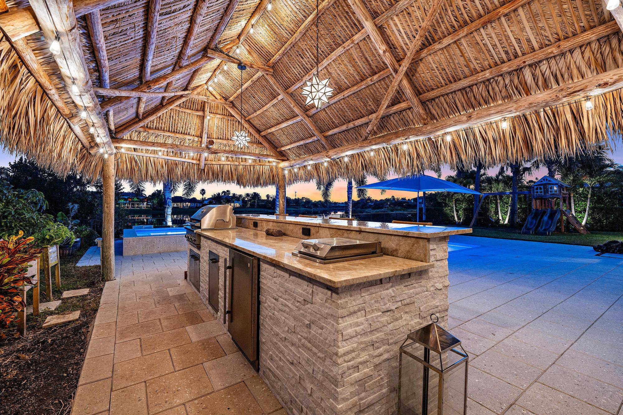 112 Manor Circle Jupiter, FL 33458 - Photo 6 of 59 Tiki Hut with Summer Kitchen