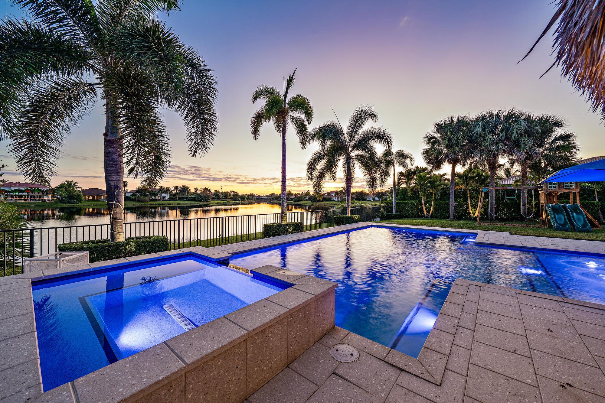 112 Manor Circle Jupiter, FL 33458 - Photo 8 of 59 Twilight Exterior Lakeview