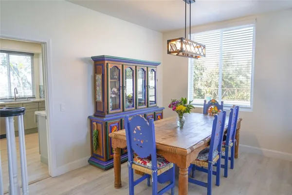 a kitchen with a sink stainless steel appliances and cabinets