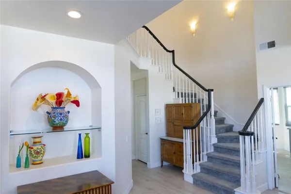 a view of entryway with wooden floor