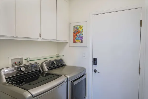 a bathroom with a sink toilet and mirror