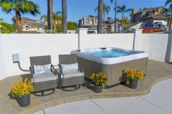 a potted plant sitting in front of a house