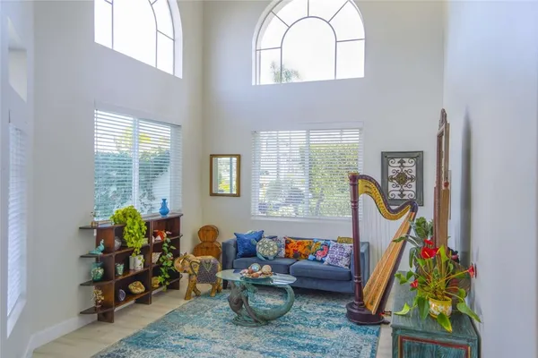 a view of a dining room with furniture window and outside view
