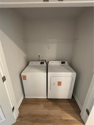a utility room with washer and dryer