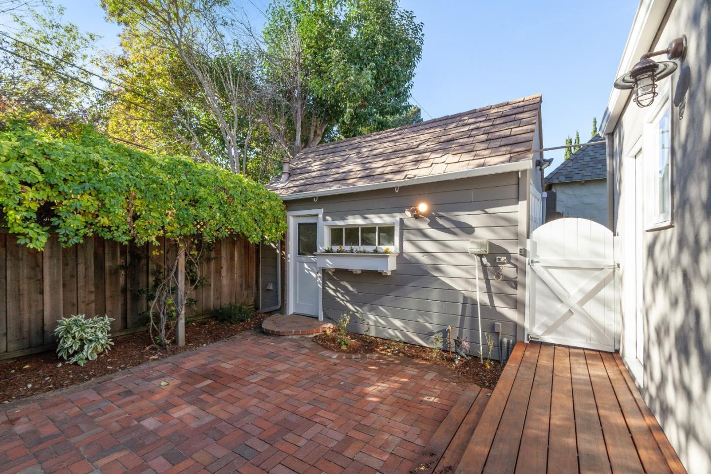 414 Williams Place San Mateo, CA 94401 - Photo 20 of 32 a view of a house with backyard and sitting area