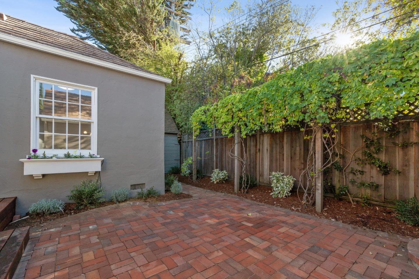 414 Williams Place San Mateo, CA 94401 - Photo 21 of 32 a front view of a house with garden