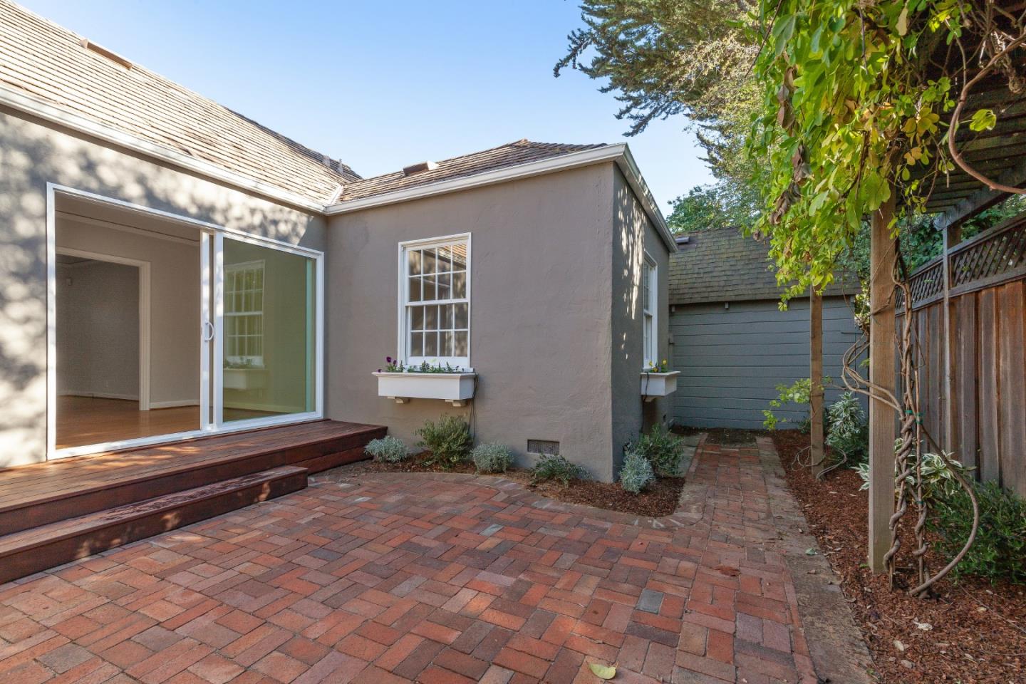 414 Williams Place San Mateo, CA 94401 - Photo 22 of 32 a front view of a house with garden
