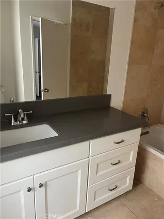a bathroom with a toilet and a sink