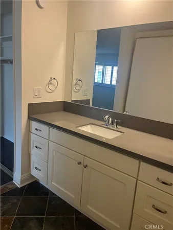 a view of kitchen with furniture and staircase