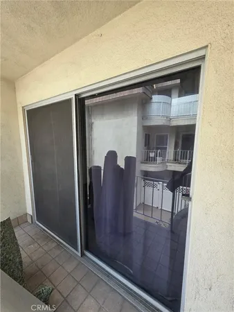 a view of living room and kitchen with furniture