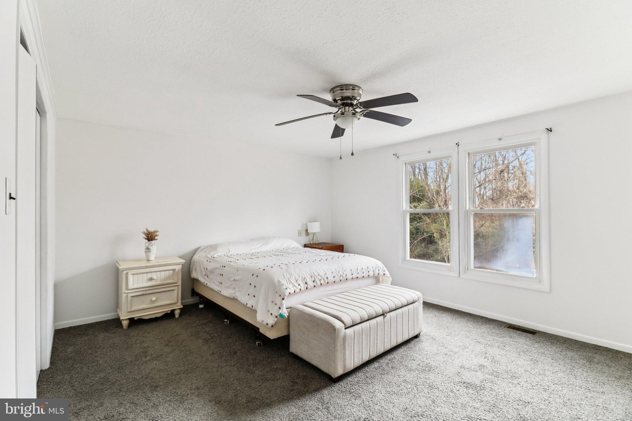 14617 Livingston Road Accokeek, MD 20607 - Photo 23 of 53 a bedroom with a bed and a window