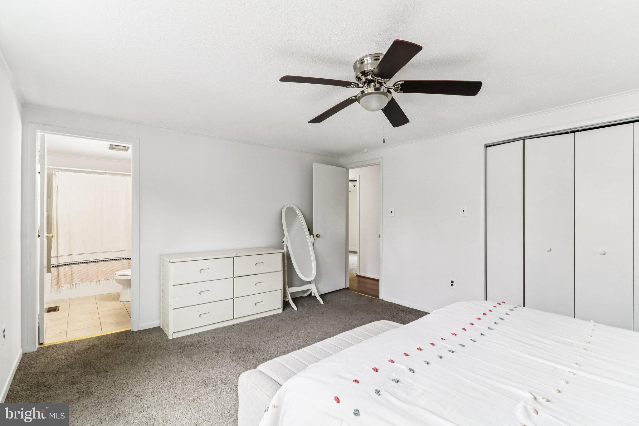 14617 Livingston Road Accokeek, MD 20607 - Photo 25 of 53 a bedroom with a bed and a window