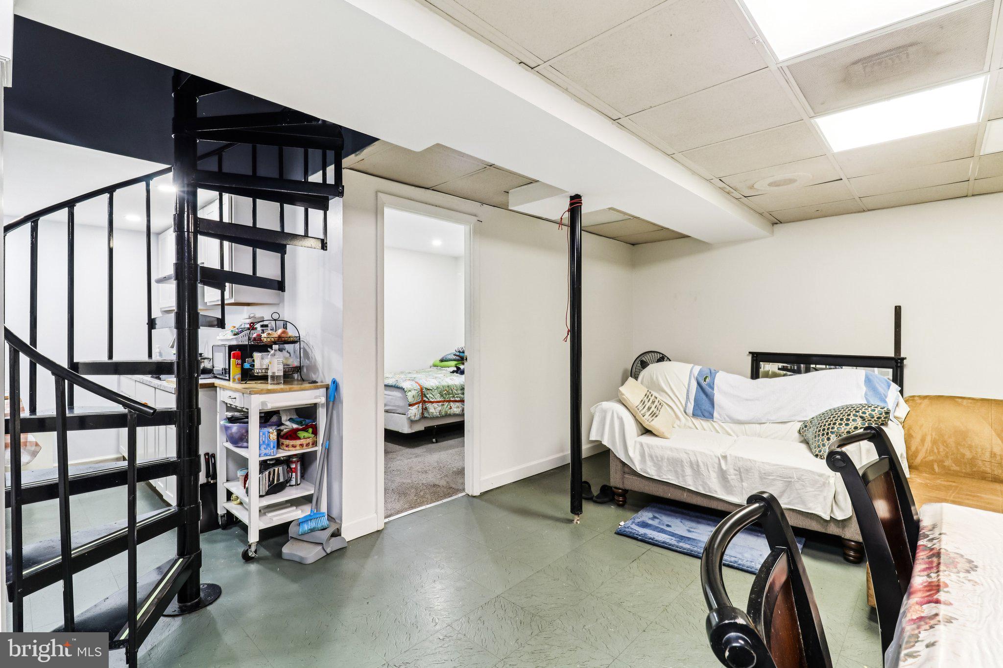 14617 Livingston Road Accokeek, MD 20607 - Photo 34 of 53 a bedroom with furniture and a book shelf