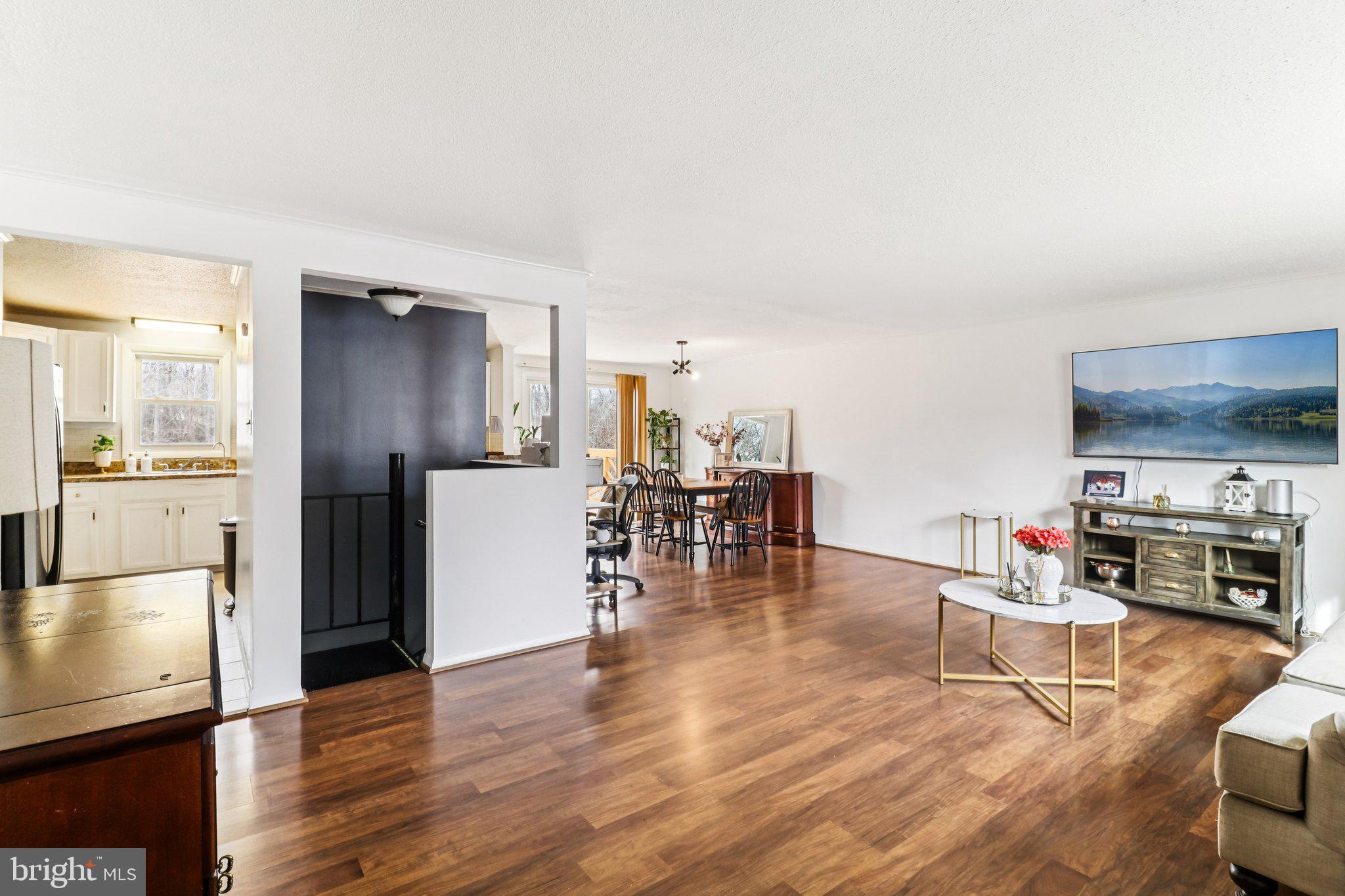 14617 Livingston Road Accokeek, MD 20607 - Photo 4 of 53 a living room with furniture and a kitchen view