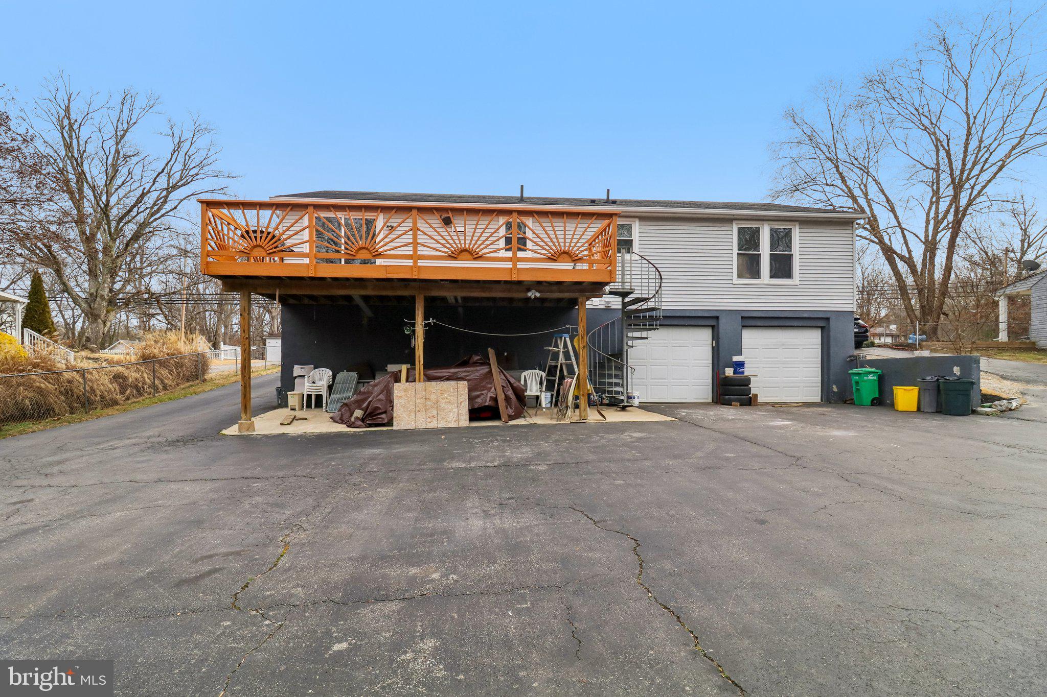 14617 Livingston Road Accokeek, MD 20607 - Photo 50 of 53 a view of a house with patio and a yard